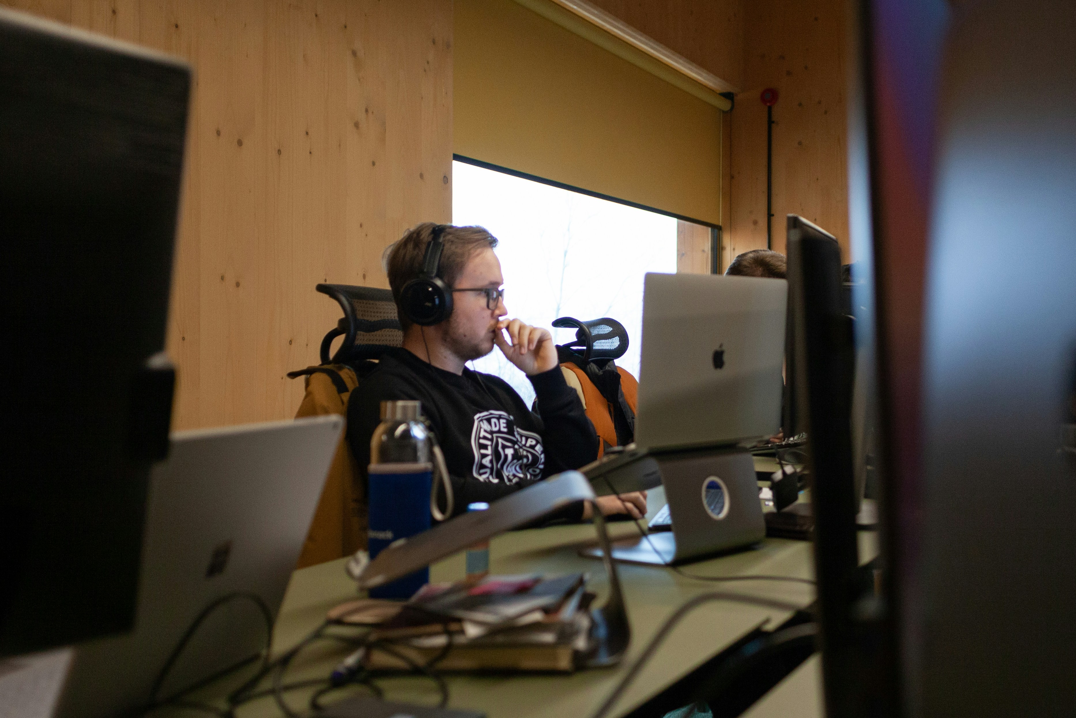 Podcast host broadcasting live from a professional streaming setup